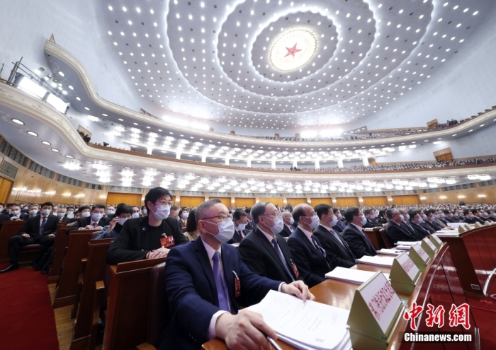 3月7日，十四屆全國人大一次會議在北京人民大會堂舉行第二次全體會議。<a target='_blank' href='/'>中新社</a>記者 盛佳鵬 攝