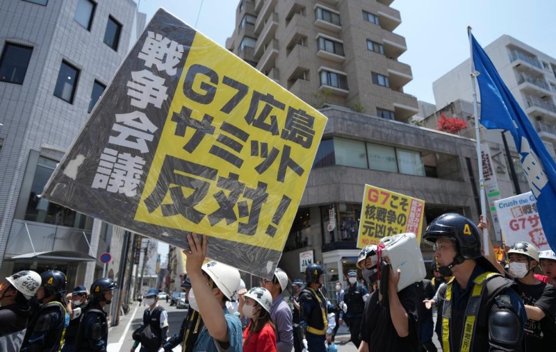 5月21日，民眾在日本廣島游行抗議七國集團峰會。新華社記者張笑宇攝